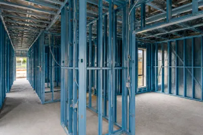 Bungalow Queenslander interior before restoration — bare, unfinished walls